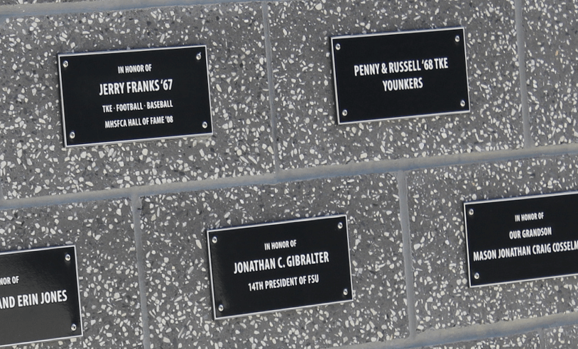 Name plaques on the stadium wall