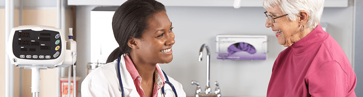 Image fo Nurse working with patient