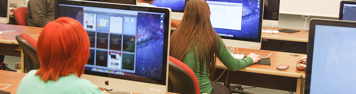 students sit at computers