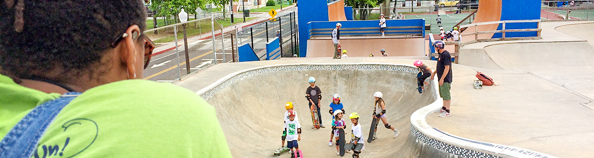elementary age children use the skating park