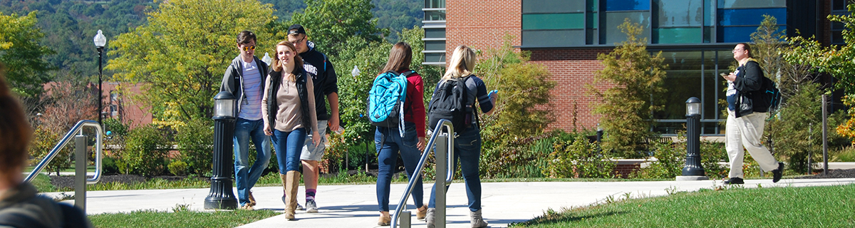 students climb the stairs in front of CCIT