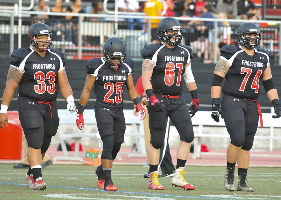 Photo of the 2017 Bobcat Captains: Senior Defensive Lineman #33 Niles Scott, Senior Defensive Back/Punter #25 Dante Chinnery, Senior Offensive Lineman #67 Jake Townsend and Senior Offensive Lineman #74 Christian Walsh