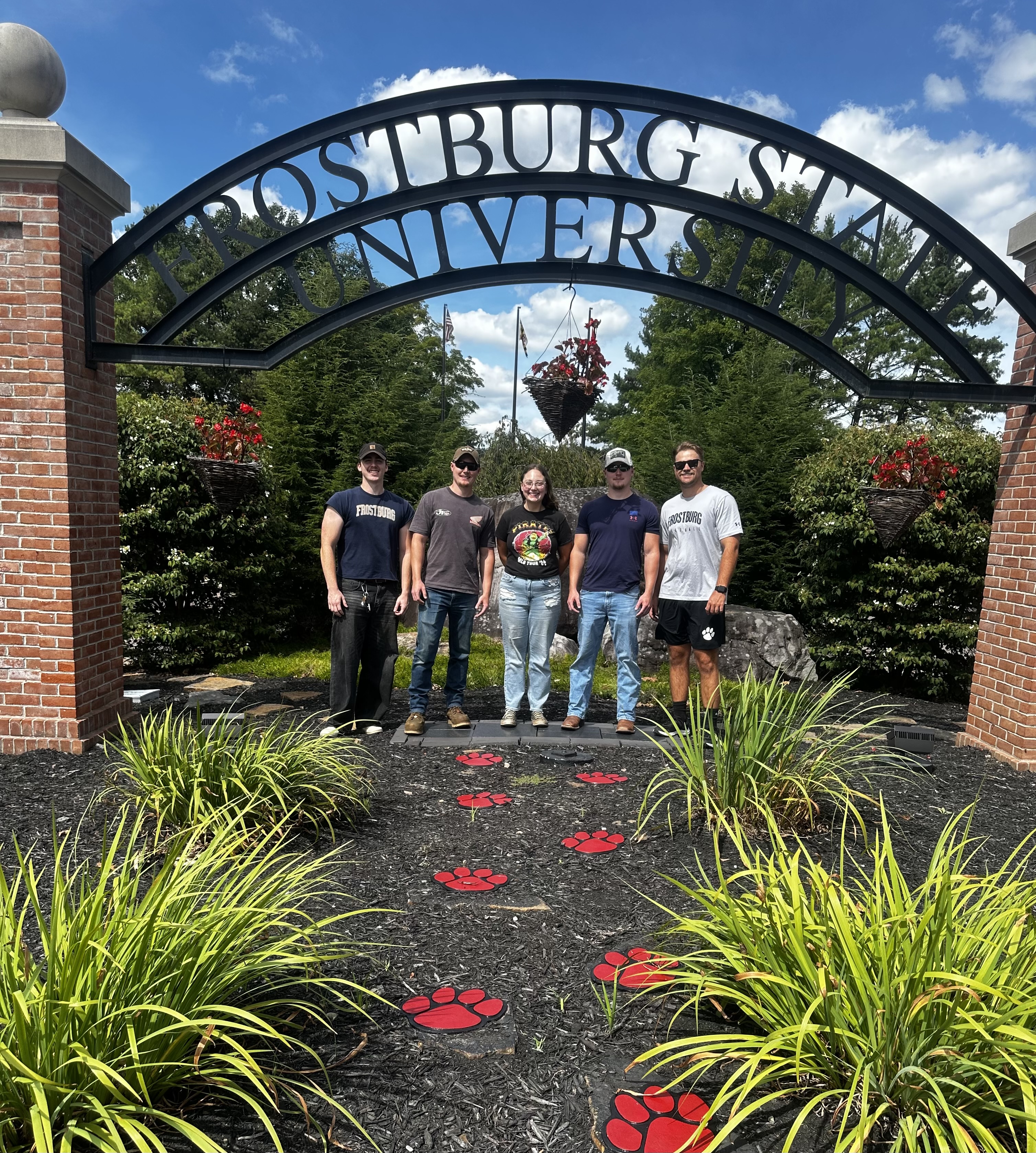campus entrance with student workers