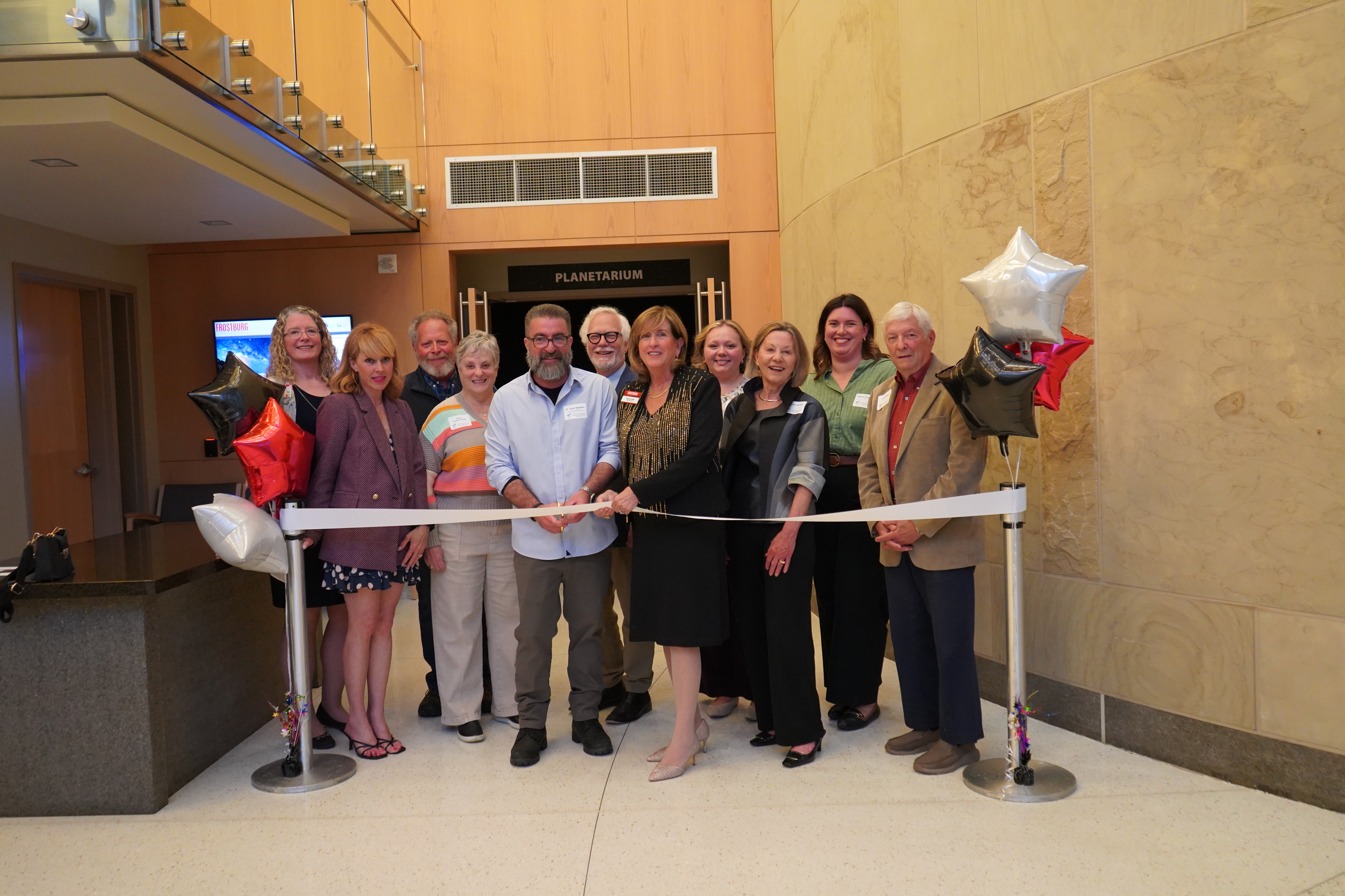 invited guests at the ribbon cutting 