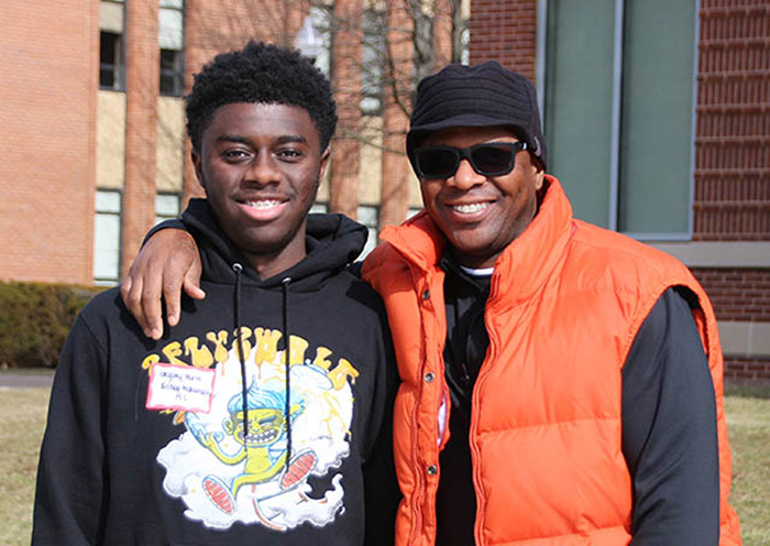 dad and son at open house