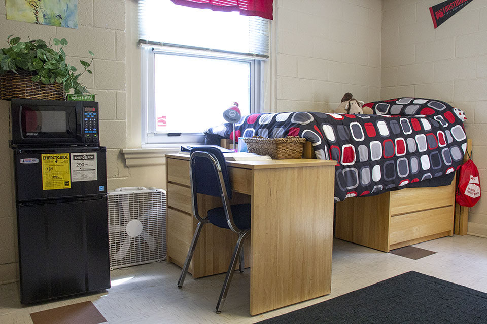 Student bed, desk and micro fridge arrangement