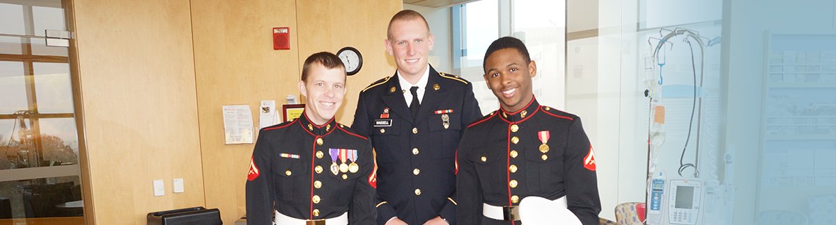 photo of three veterans in dress uniforms