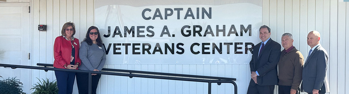photo of group outside the Captain James A. Graham Veterans Center