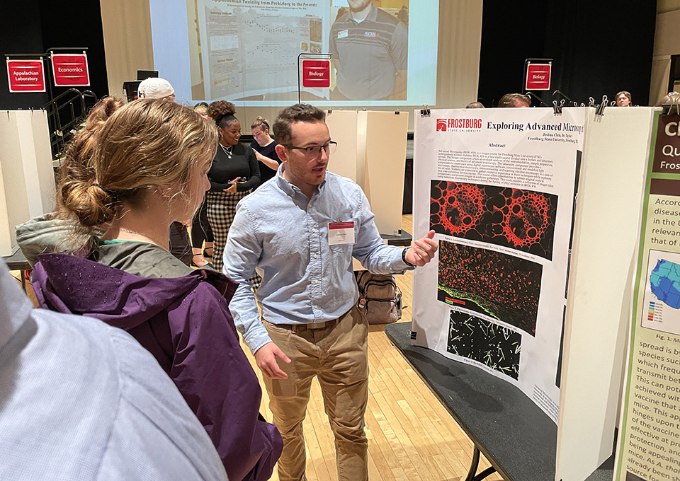 student presentations at undergraduate research symposium