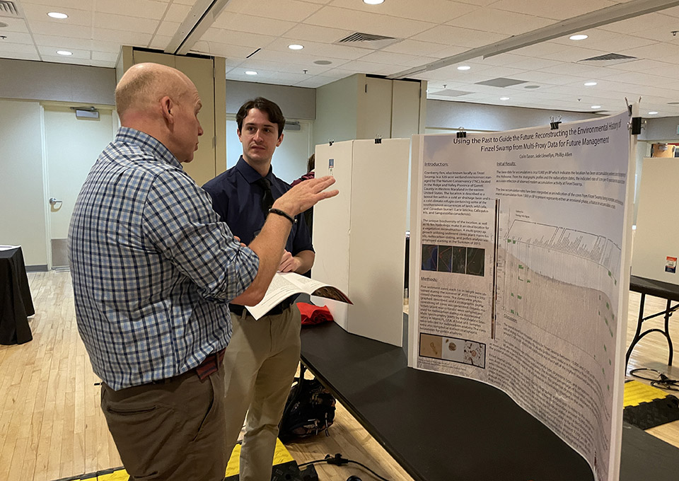 student presentations at undergraduate research symposium