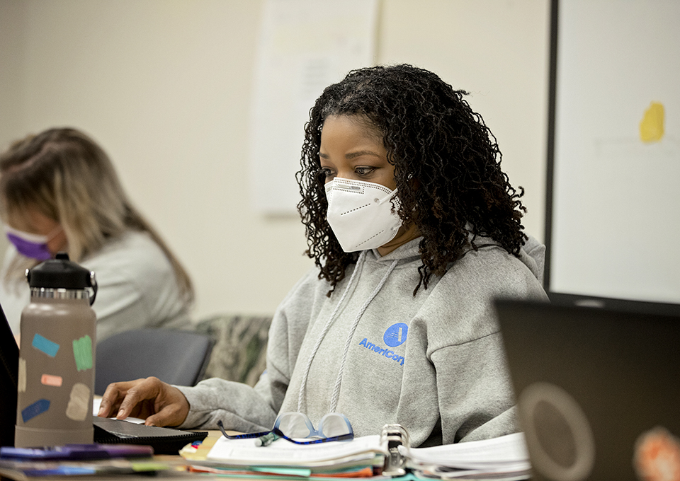 Students in the classroom working at desk