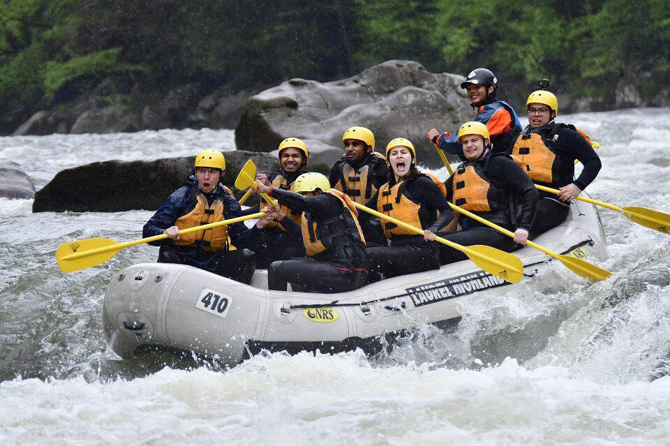 Group of people whitewater rafting on youghiogheny river in wv