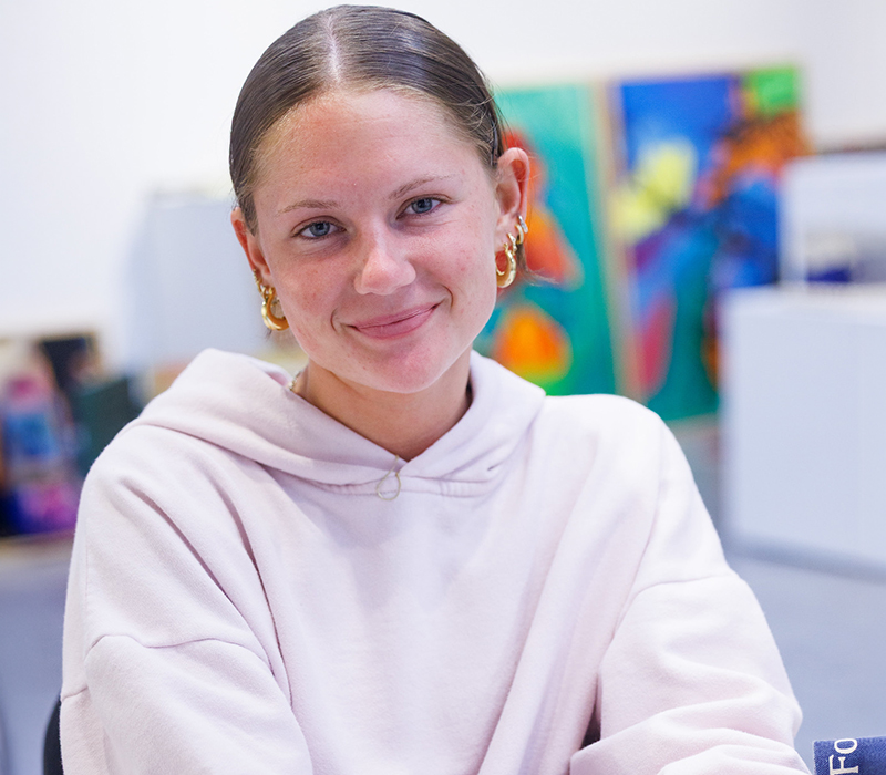 Art student girl with earrings