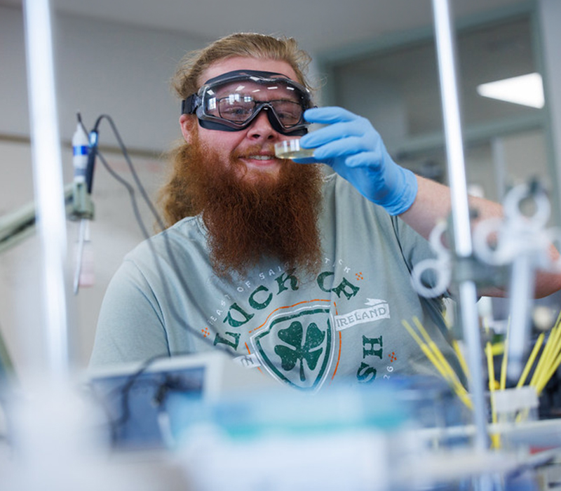 Science Student with becker in lab Engineering