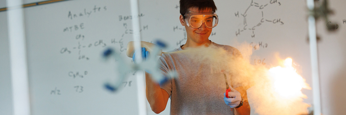 science-lab-student-with-fire-chemcials