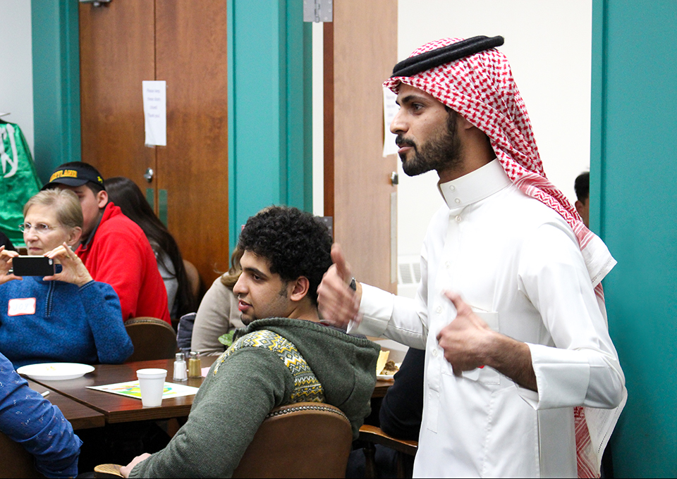 Saudi student speaking to group
