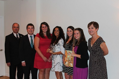 Gianna Marino receiving award