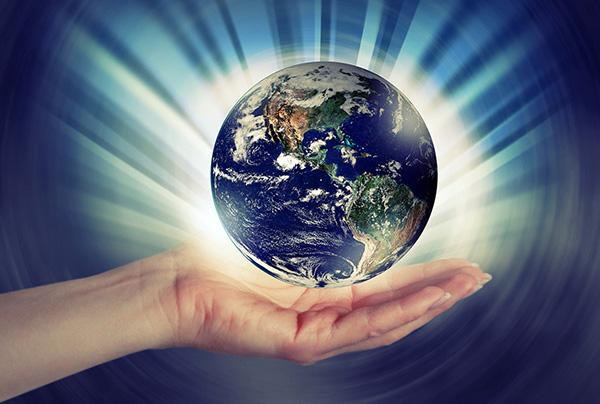 graphic of hand holing the earth