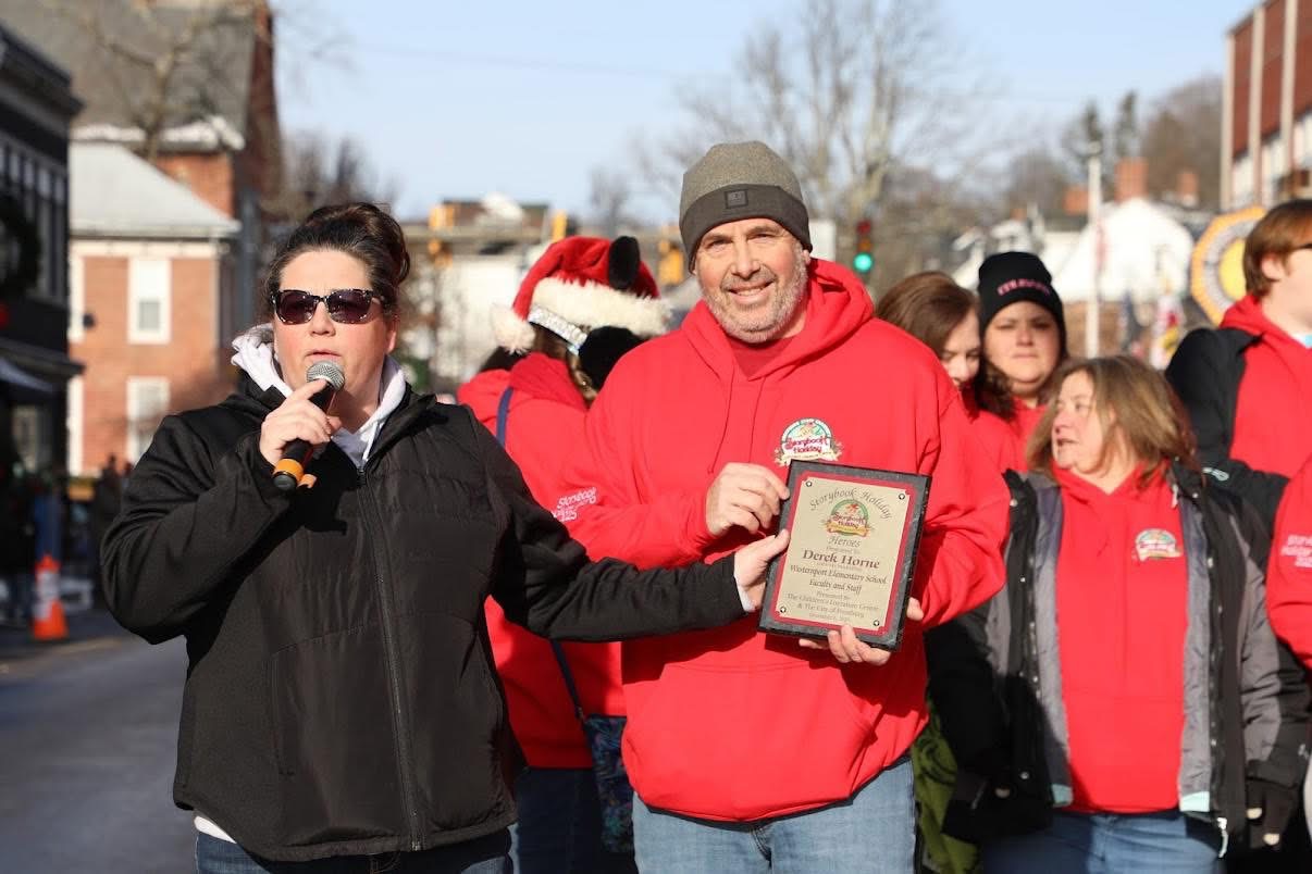 Westernport Elementary Principal being presented award