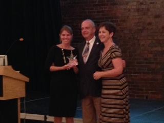 Emily Kate Moon receiving award