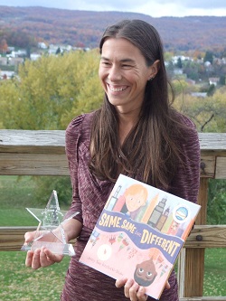 Jenny Sue-Kostecki Shaw with Award and her book