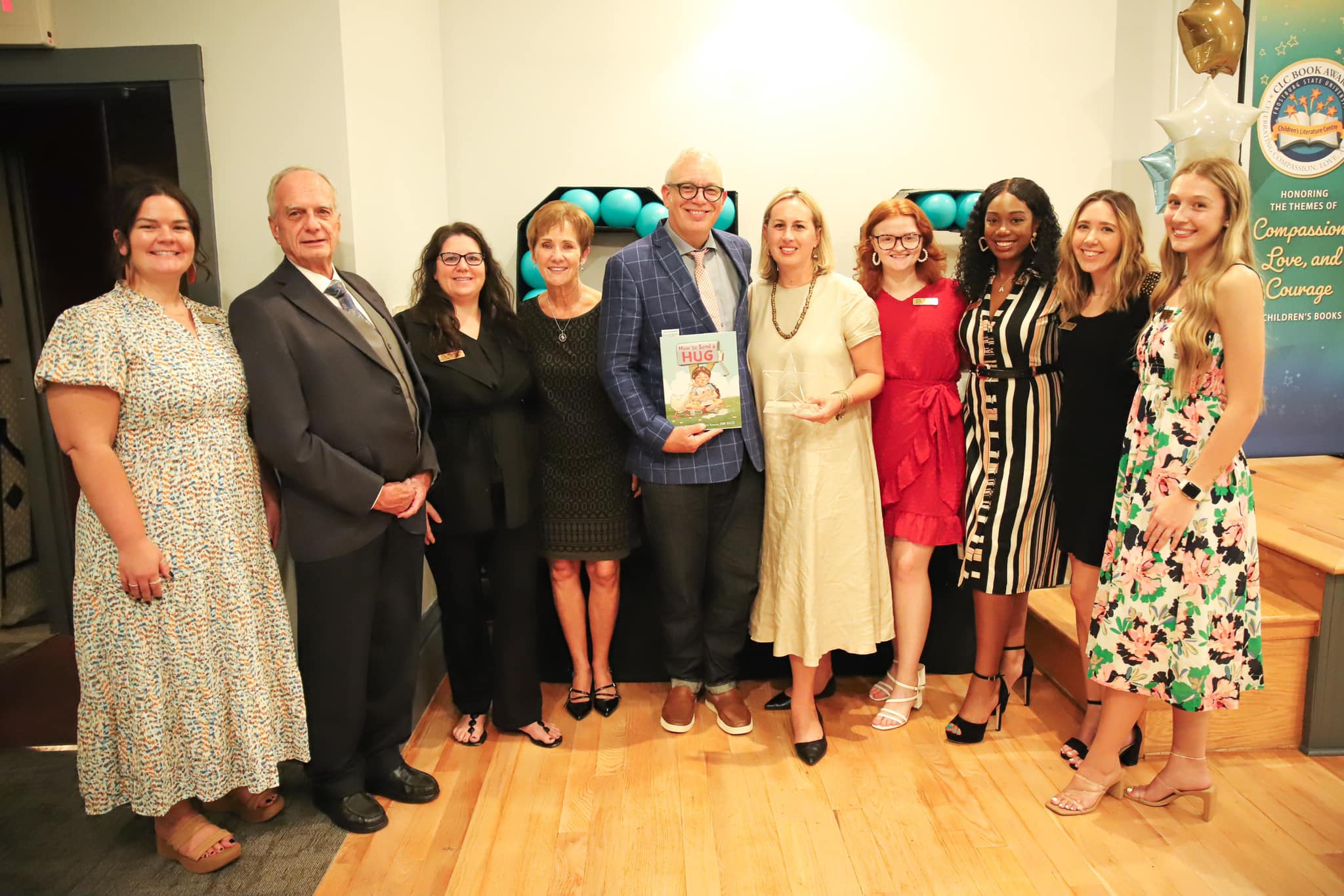 Author Marcy Campbell with Bill Bingman and others