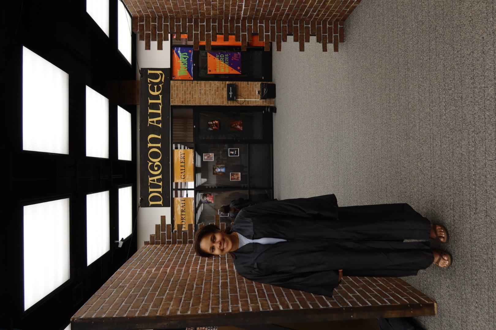 Wizard posing in front of Diagon Alley