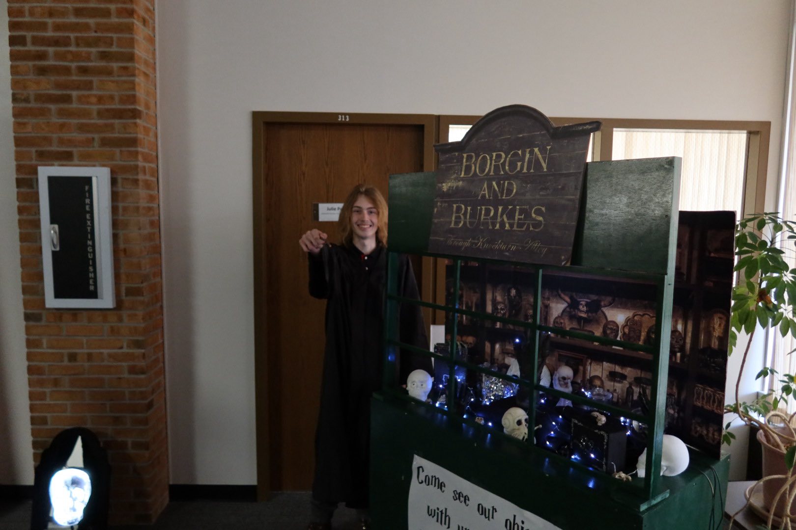 Wizard standing at interactive wand station