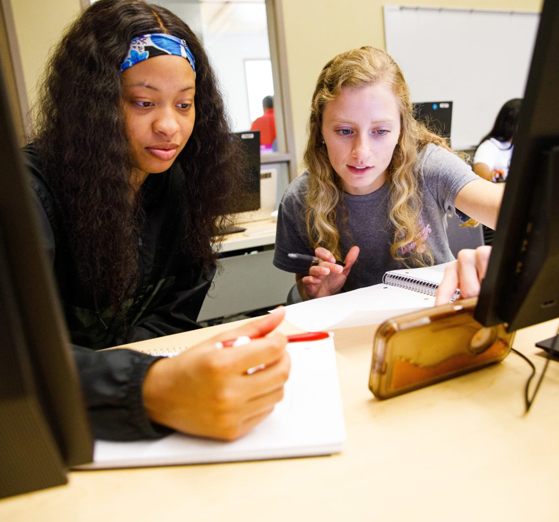 Students looking at phone