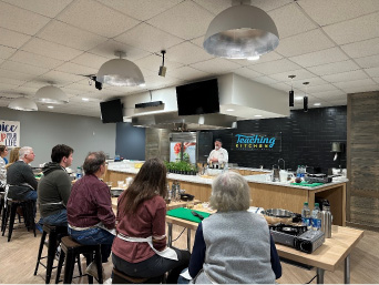 Trained chefs teach culinary skills at the Chartwells Teaching Kitchen