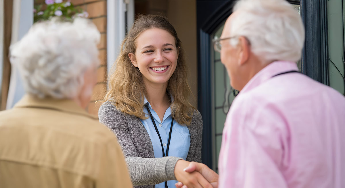 Young social worker with elderly couple