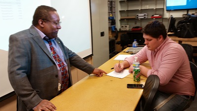 Student working with tech