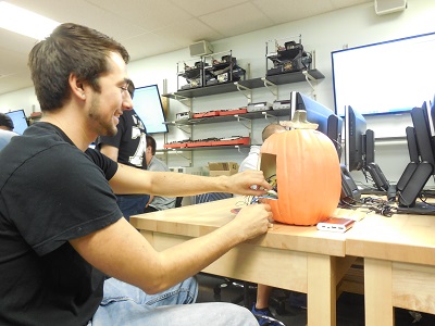 Student working with tech