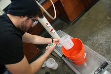 Student conducting fluid mechanics lab