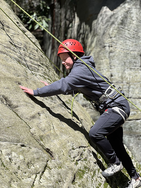 rockclimber on face