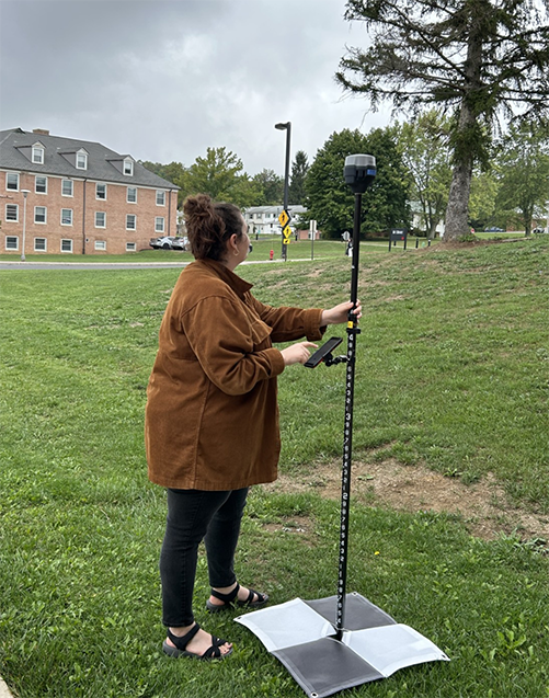 student surveying on FSU campus