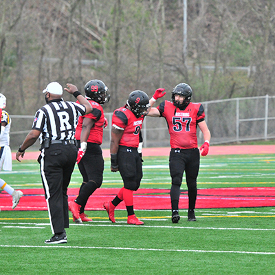football players and ref