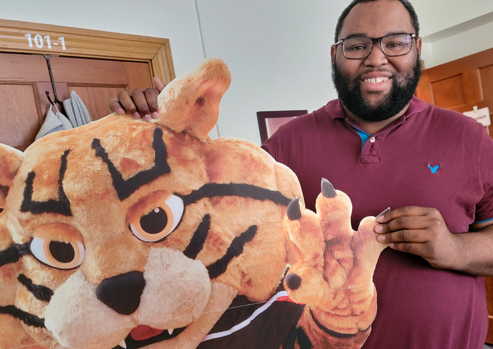 Aaron Ware with bobcat cut-out