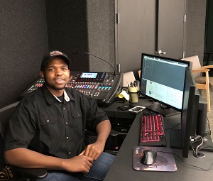 Production Assistant, and volunteer, Eugene Webb mixing audio for a planetarium show