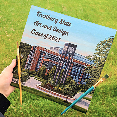 grad cap- painting of fsu campus