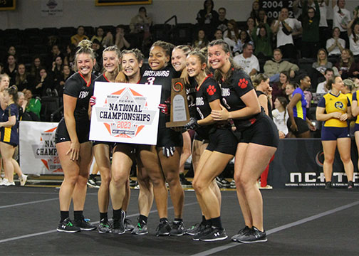 acro tumbling teams build a human pyramid