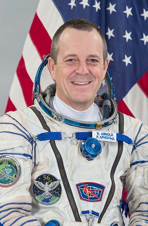 Ricky Arnold in astronaut suit official NASA photo