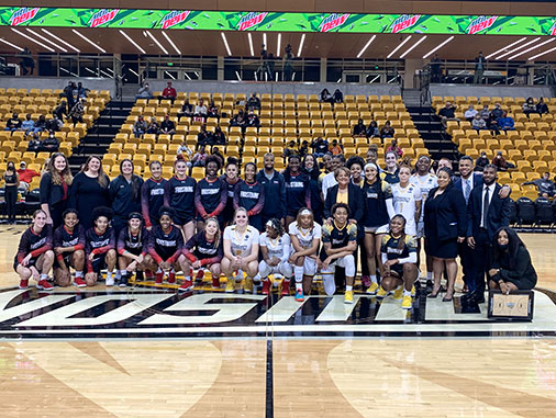 FSU and Towson ladies basketball pose for photo