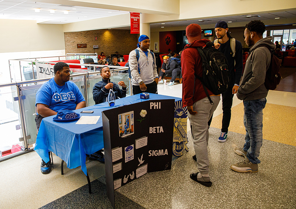 Fraternity in Lane Center promoting their organization